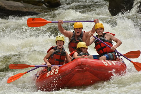 Father-and-son-white-water-rafting