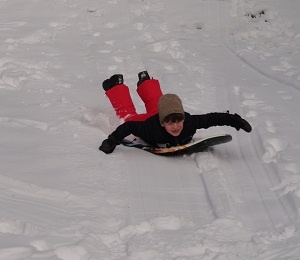 summer-camp-for-teenagers-sledding.jpg