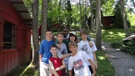 7 male Campers posing for a group picture.