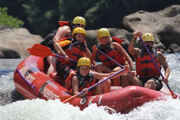 A group of Camper whitewater rafting.