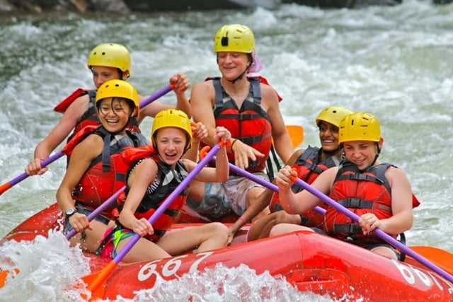 A group of Campers river rafting