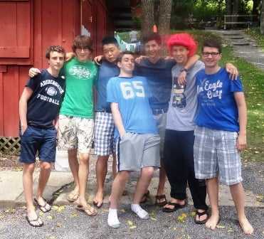7 male Campers posing for a group picture.
