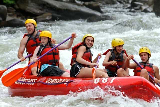 A group of Campers river rafting.