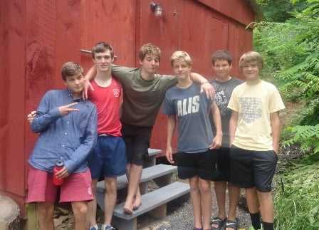 6 male Campers posing for a group picture.