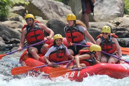 A group of Campers whitewater rafting.