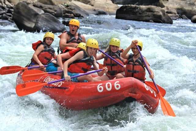 A group of teen Campers in a white water session.