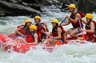 A group of Campers in a white water session.