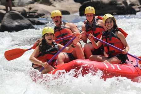 A group of Campers whitewater rafting.