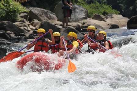 A group of Campers whitewater rafting.
