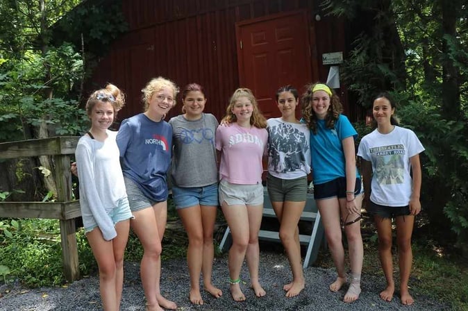 A group of female Camper pose for a picture