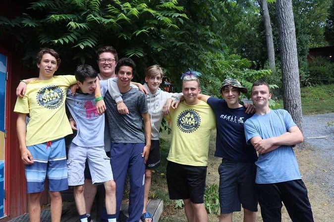 A group of Teen Campers pose for a picture.