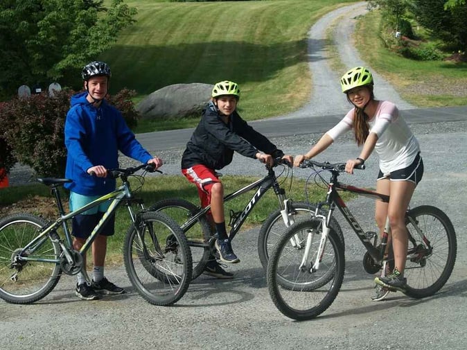 3 Teen Campers pose for a picture.