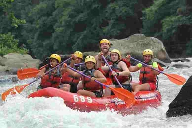  A group of Campers white water rafting