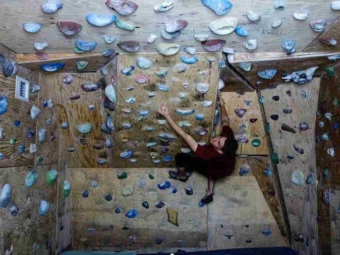 Picture of a Camper rock climbing