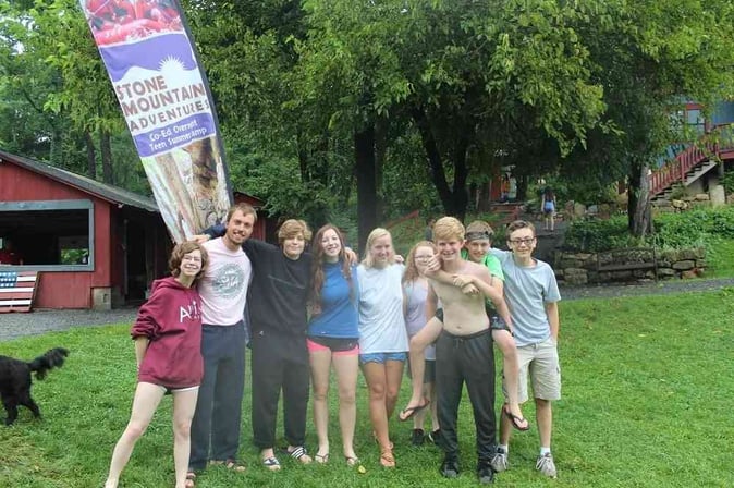 A group of Teen Campers pose for a group picture.