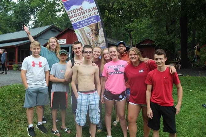 A group of Teen Campers pose for a group picture.