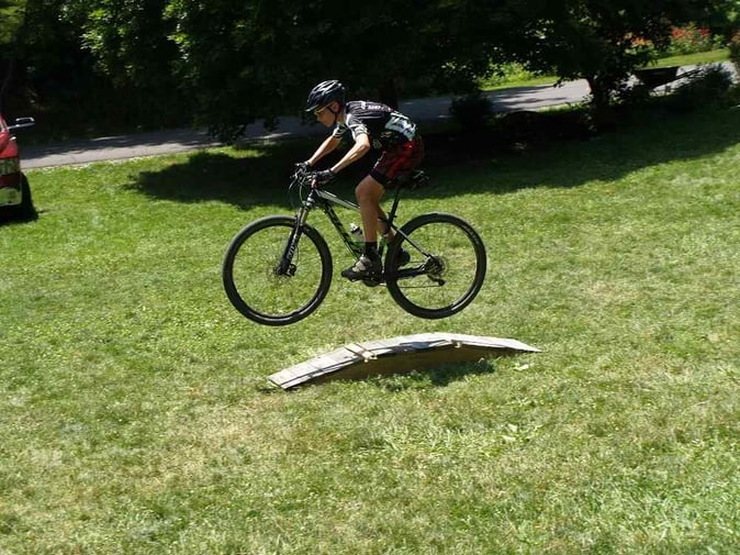 A Teen Camper performing arc of movement while descending from the mountain.