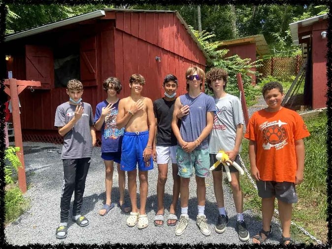 A group of Teen Campers pose for a picture.