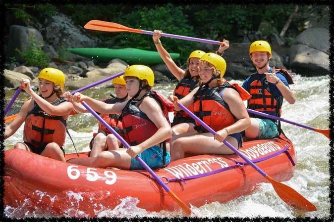 A group of Campers white water rating.