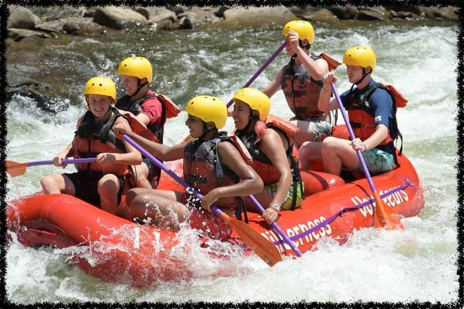 A group of  Campers white water rafting