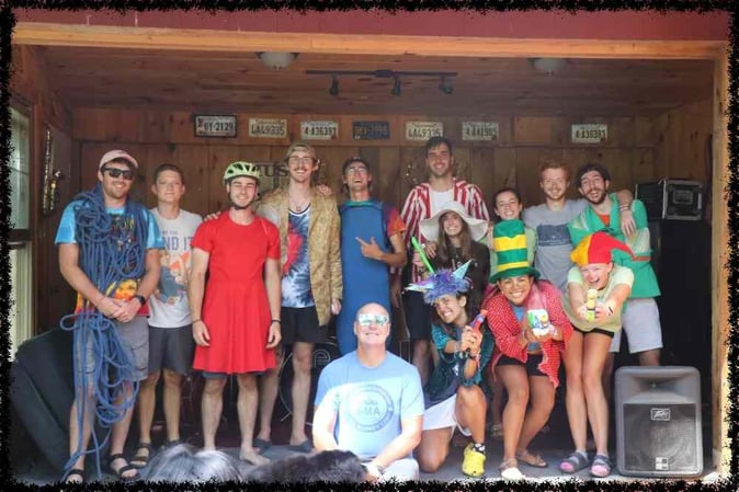 The Camp director Jud in a group picture with some Campers
