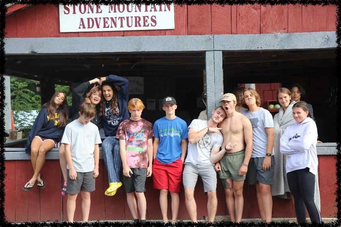 A group of Camper pose for a picture
