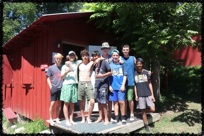 A group of Teen male Campers pose for a picture
