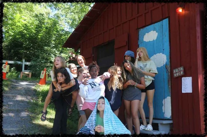 A group of Teen female Campers pose for a picture