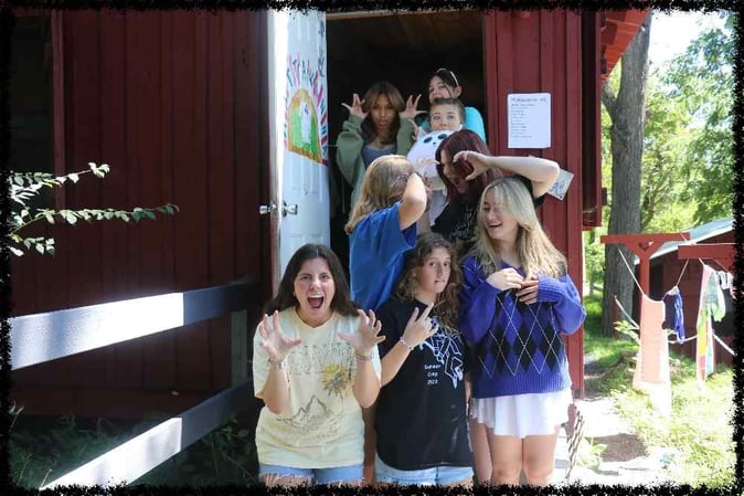 A group of Teen female Campers pose for a picture