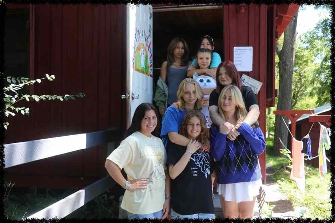A group of Teen female Campers pose for a picture