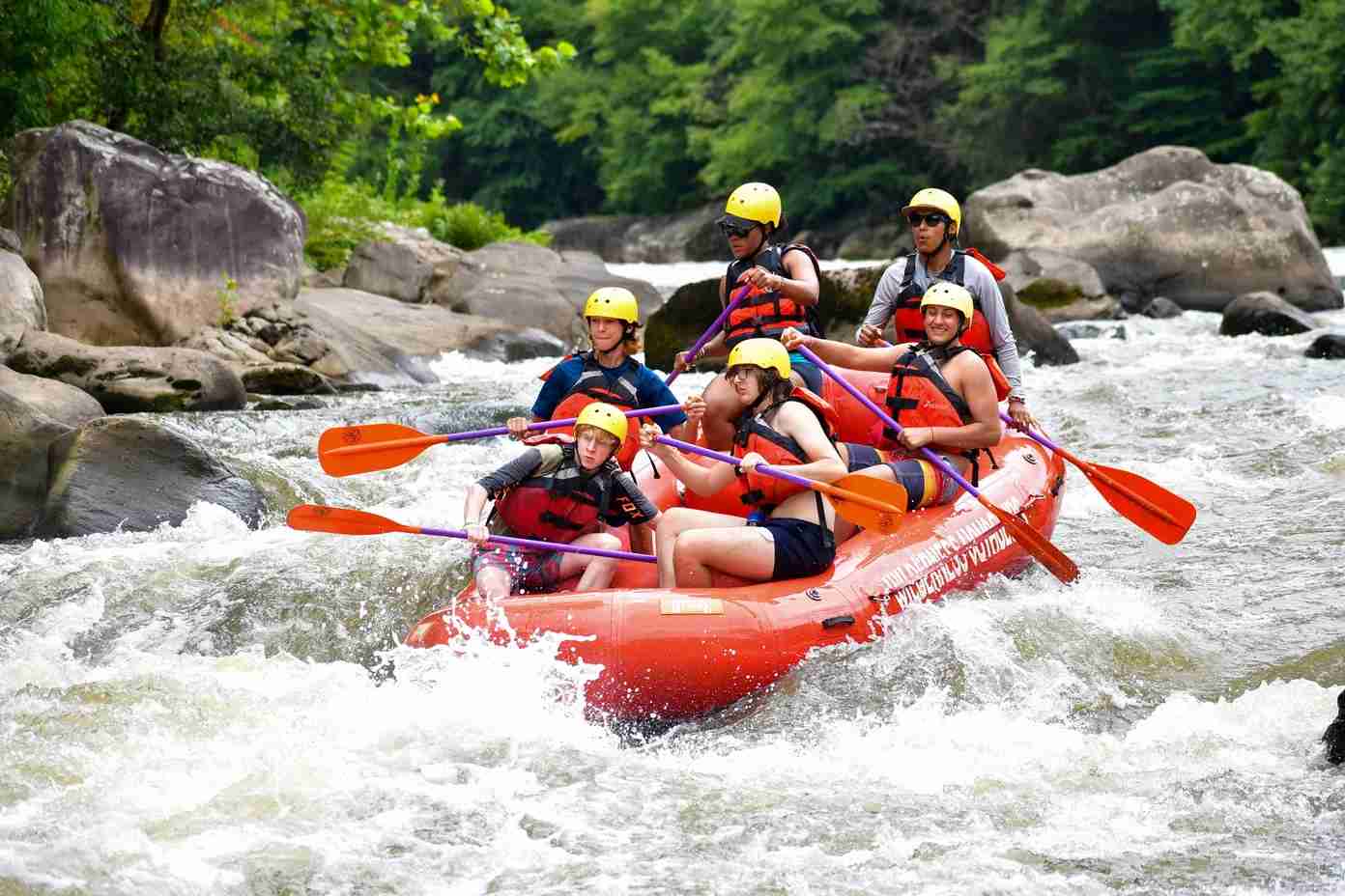 A group of Campers white water rafting