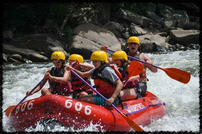 A group of Campers White Water Rafting