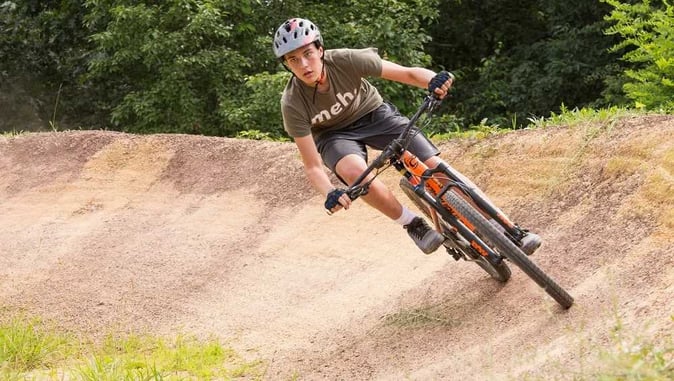 A Teen Camper Mountain Biking