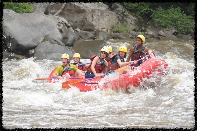 A group of Campers White Water Rafting