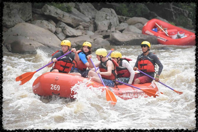 A group of Campers White Water Rafting