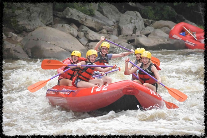 A group of Campers White Water Rafting