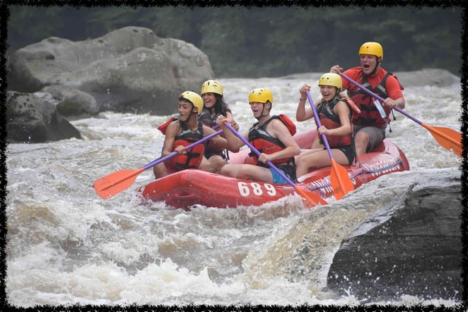 A group of Campers White Water Rafting