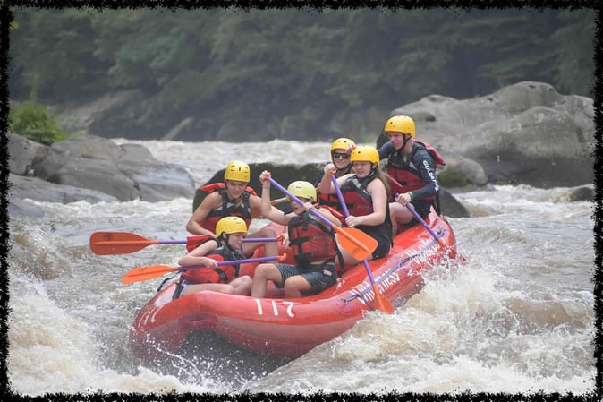 A group of Campers White Water Rafting