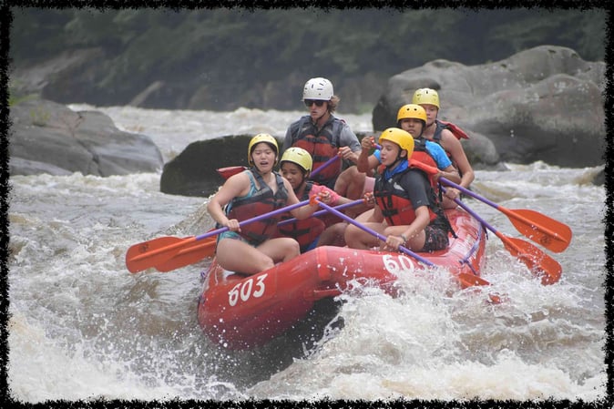 A group of Campers White Water Rafting