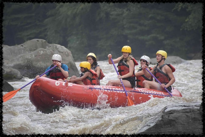 A group of Campers White Water Rafting