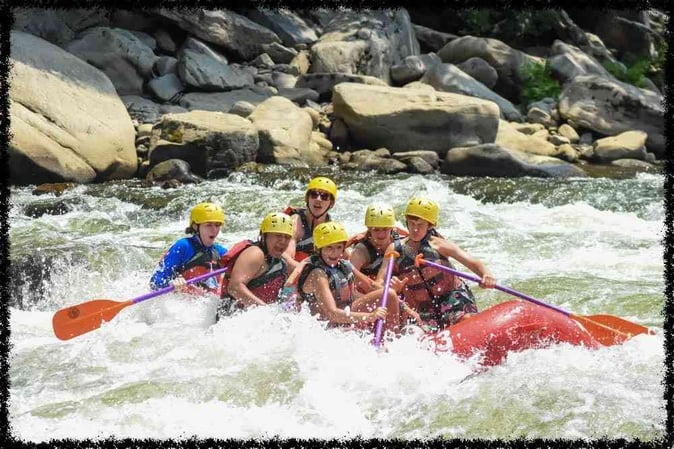 A group of Campers White Water Rafting