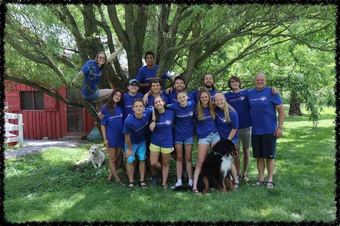 SMA camp director, Mr Jud in a group picture with some Campers