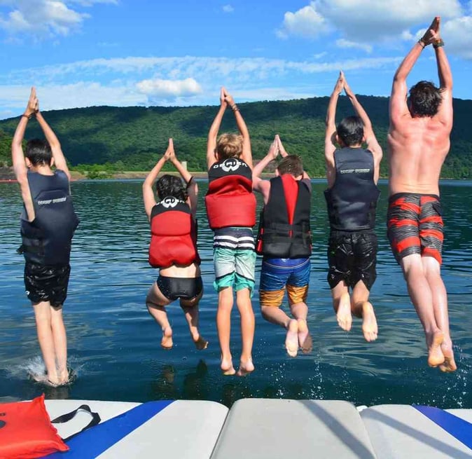 Picture of Teen Campers diving into the ocean