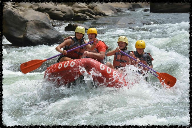 A group of Campers White Water Rafting