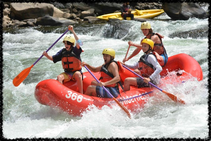 A group of Campers White Water Rafting