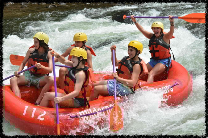 A group of Campers White Water Rafting
