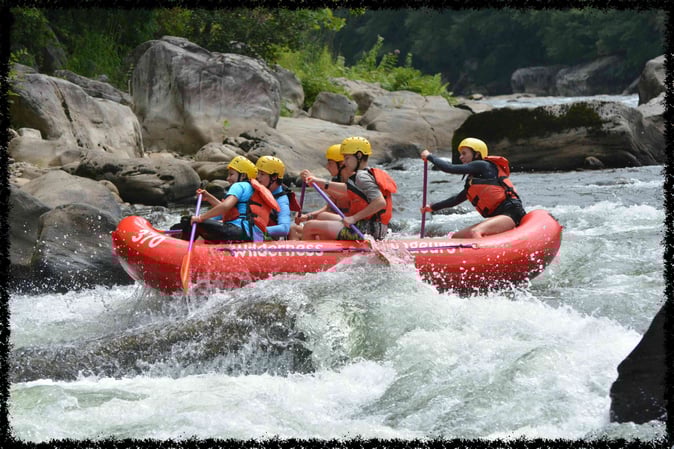 A group of Campers White Water Rafting