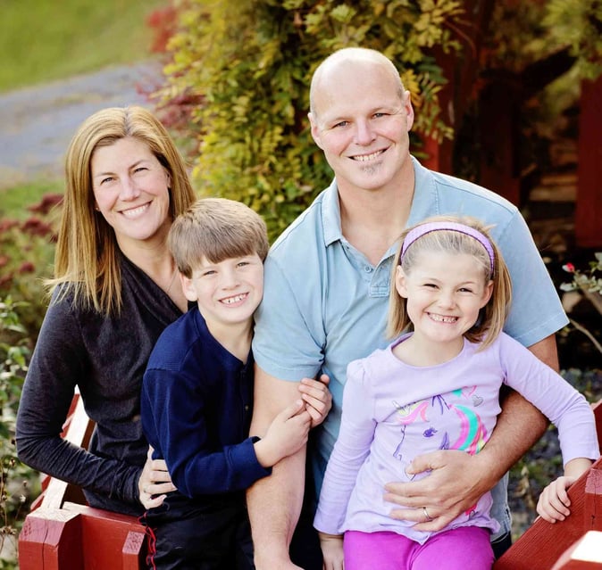 Picture of the camp director, Jud with his family