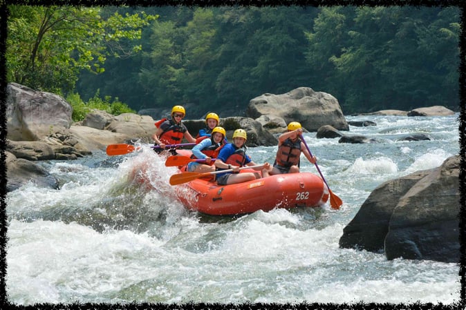 A group of Campers White Water Rafting