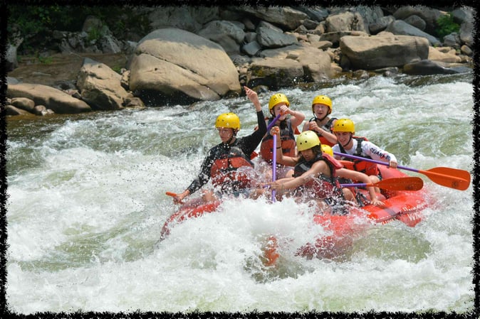 A group of Campers White Water Rafting